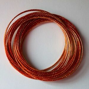 Orange Intertwined Multi Bangle Bracelet.